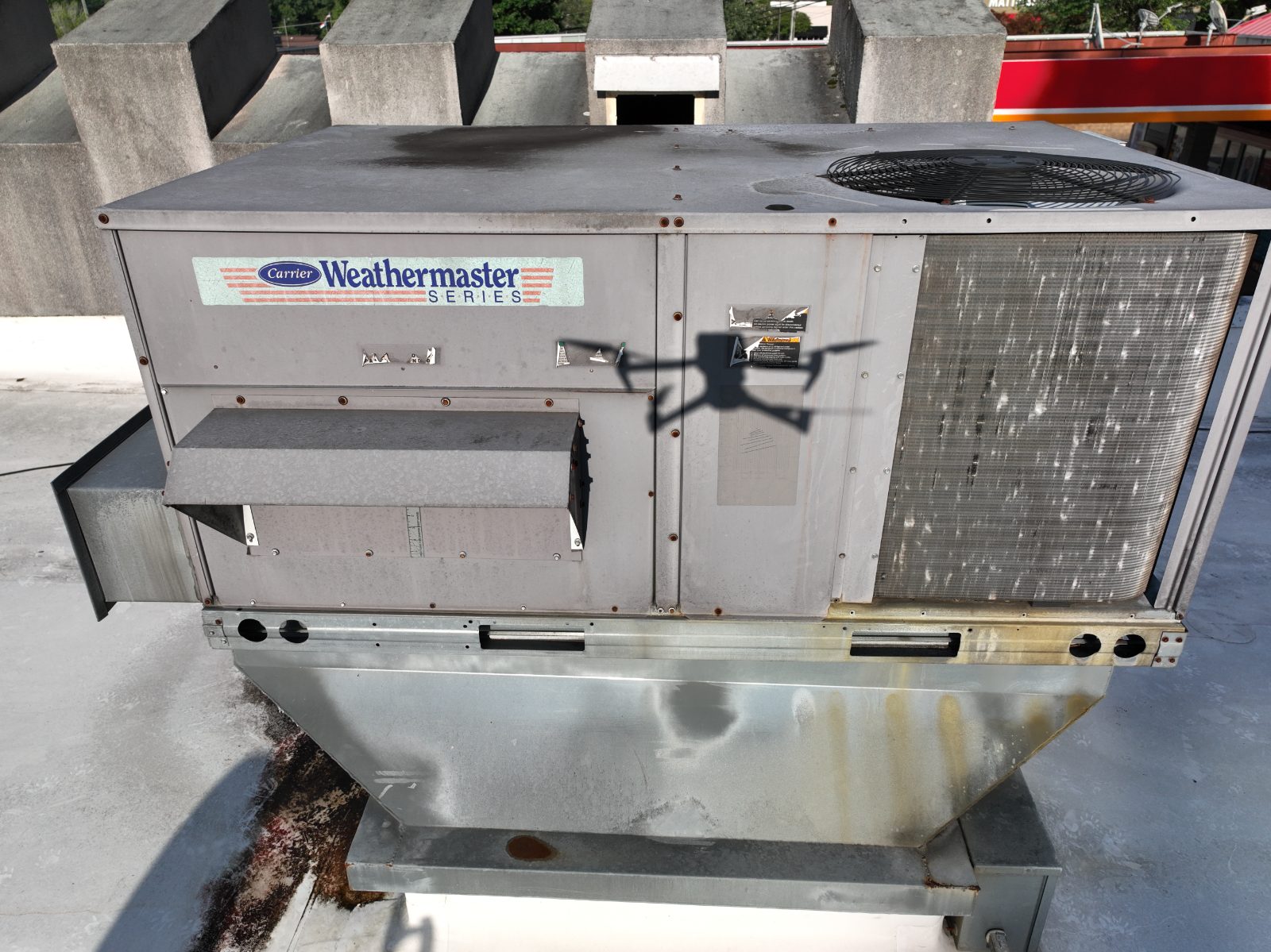 Aerial drone photograph of a rooftop HVAC unit captured during site documentation