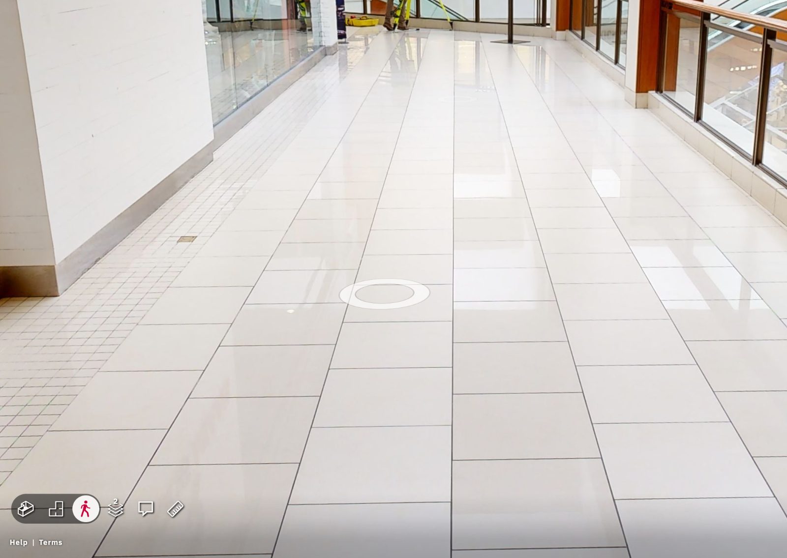 Interactive Matterport-style 3D walkthrough of a retail mall corridor